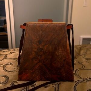 Real wood purse hand made bought in Croatia from a small business, quality wood.